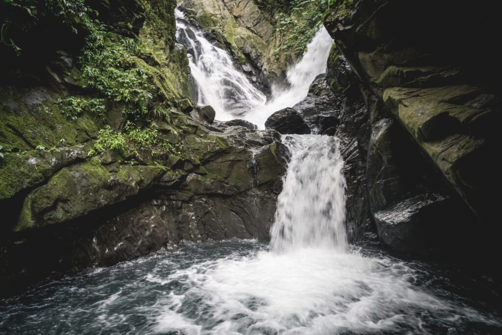 Two waterfalls in Taiwan uniting into one stream in the corridor canyon