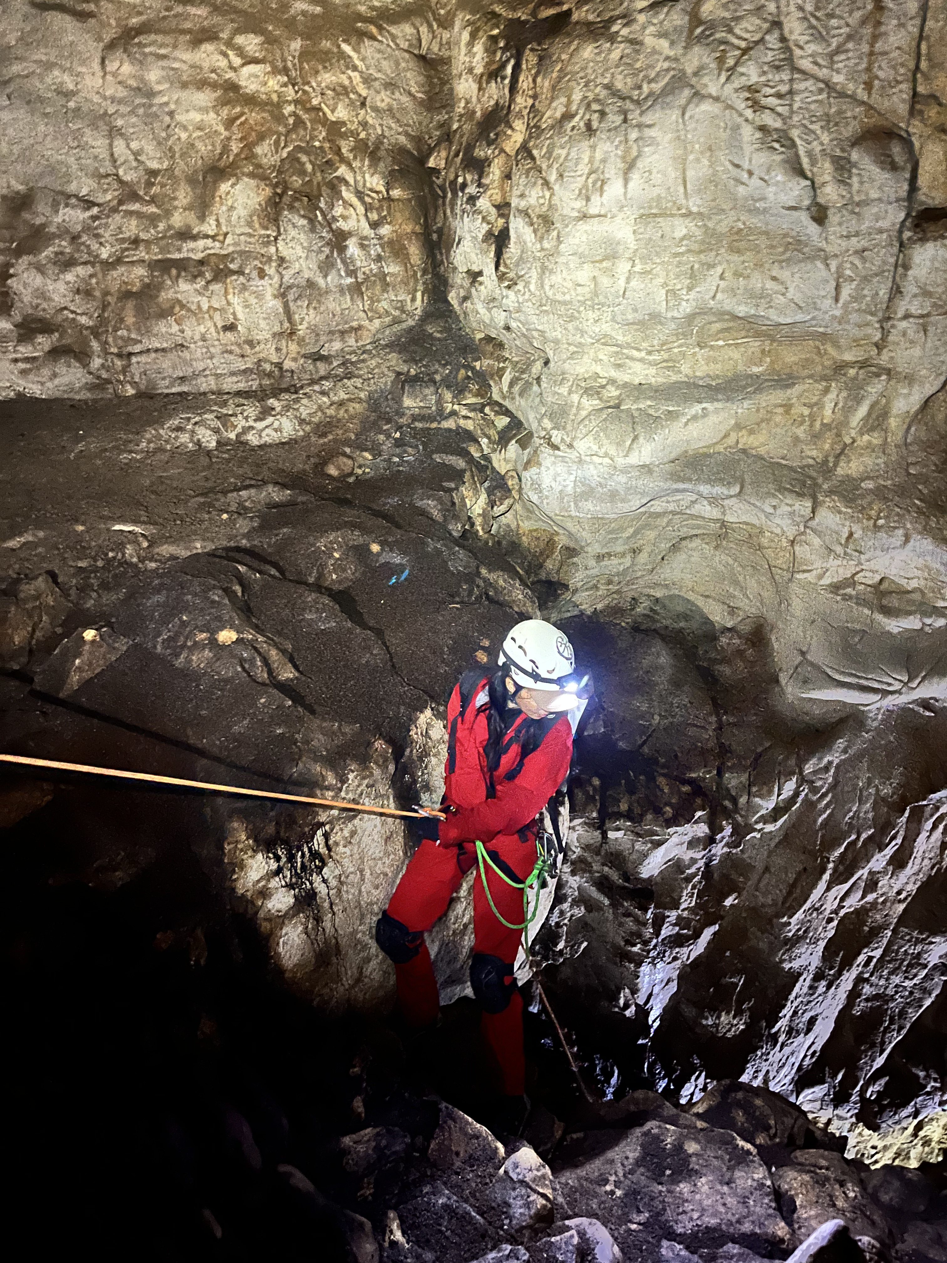 Descending into a cavern in a cave in Hubei.